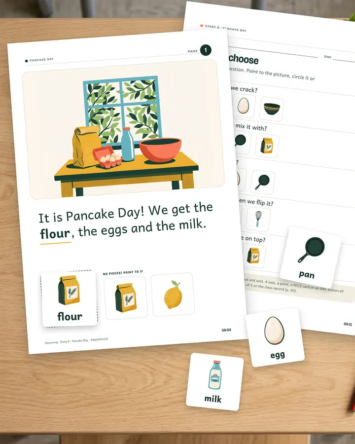 Pancake Day book page with the picture pieces and the Point & choose sheet on a classroom table